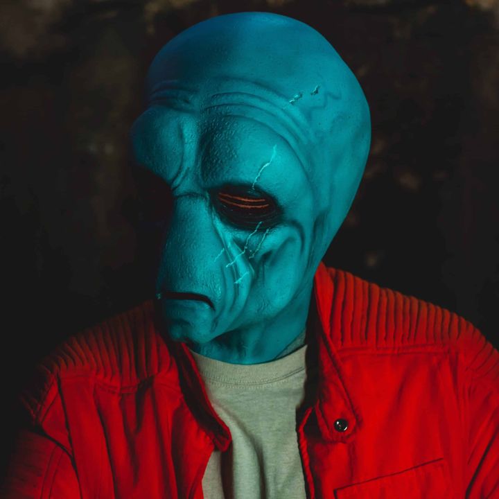 Close view of a painted Duros latex mask
