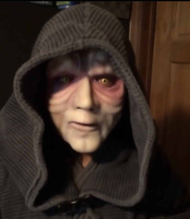 Cosplayer @davirakuy as Emperor Palpatine in a custom mask