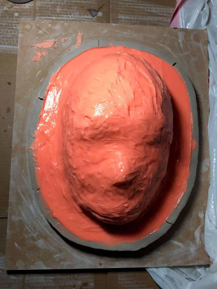 Opened silicone mold of the Emperor's face