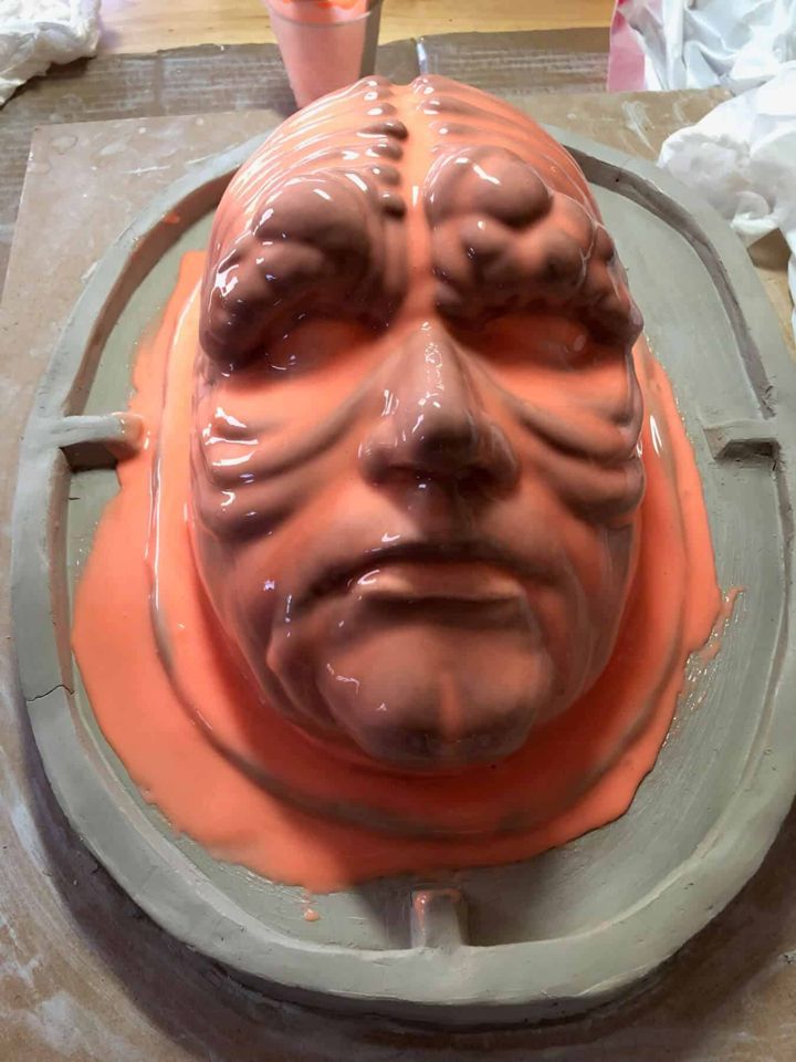 Orange silicone brushed over the Palpatine sculpt