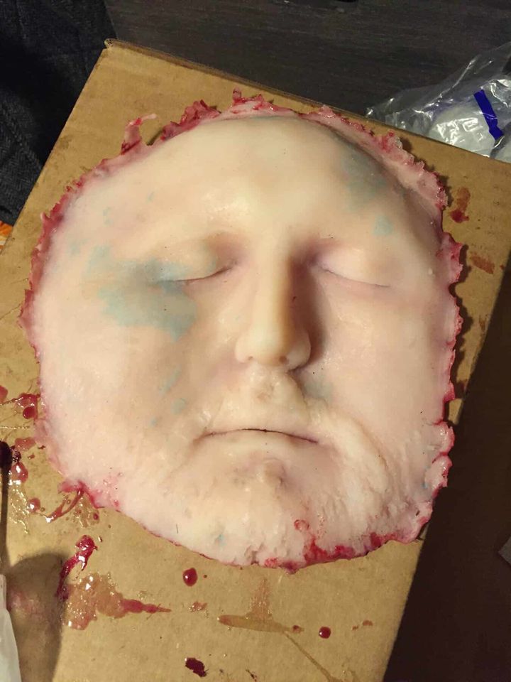 Pale silicone face fresh out of the mold