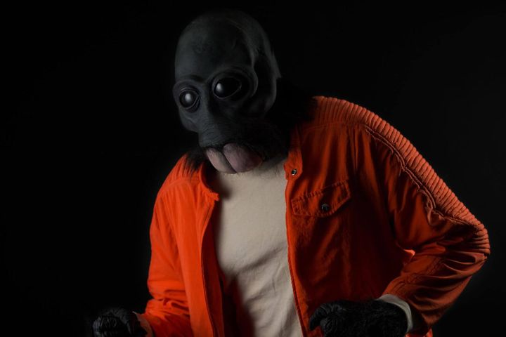 Ponda Baba cosplayer in orange jacket